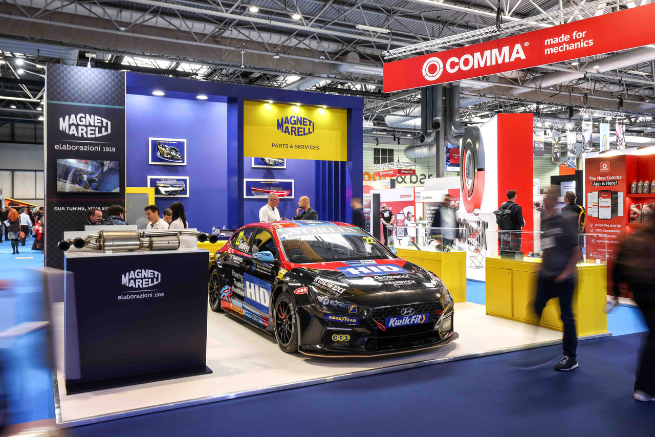 View of the Magneti Marelli Parts & Services stand at Automechanika Birmingham 2025, seen from a from corner angle. 